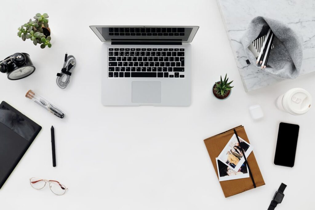 A clean workspace with a timer and a notebook, symbolizing focused work.